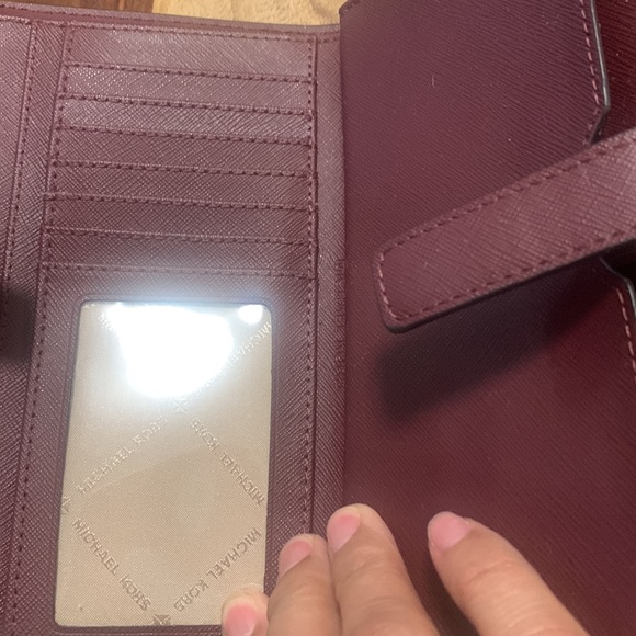Safiano Leather wine Michael Kors Leather Phone Wristlet. Removable holder - Picture 5 of 6